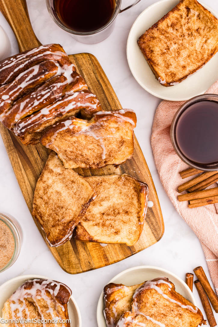 Soft, gooey cinnamon pull apart bread with buttery layers and a sweet powdered sugar glaze—perfect for brunches and holidays in a 9x5 loaf today! #cinnamonbread #pullapartbread cinnamon pull apart bread with sweet powdered sugar glaze dripping