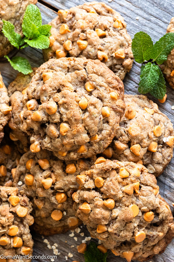 If you’re craving thick, chewy Oatmeal Butterscotch Cookies (aka Scotchies) with lightly golden edges and soft, cozy centers, this is the recipe to bake. #oatmealcookies #butterscotchcookies Oatmeal Butterscotch Cookies with butterscotch chips on top