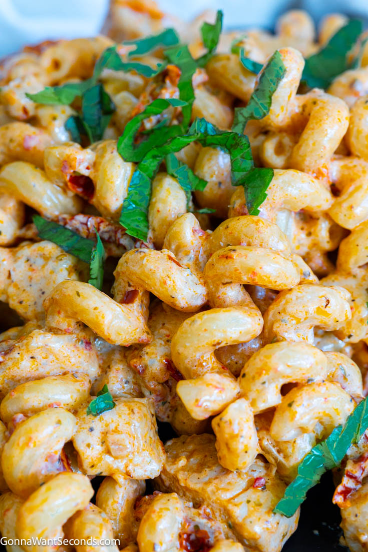 Marry me chicken pasta makes a creamy bold sauce that coats the pasta and tender chicken perfectly. It is a luscious meal that you can make in 30 minutes. #marrymechicken #chickenpasta close up Marry Me Chicken Pasta on a plate