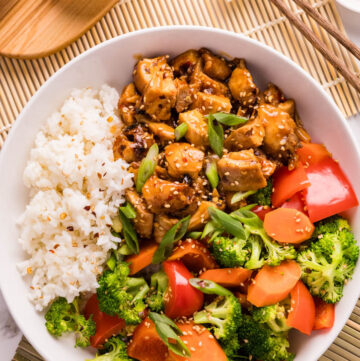 A Teriyaki Chicken Bowl made with tender, saucy chicken served with rice