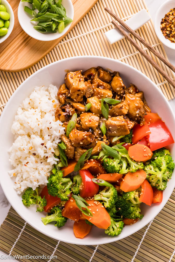A Teriyaki Chicken Bowl made with tender, saucy chicken served over rice and finished with crisp vegetables for a balanced, flavorful weeknight dinner. #teriyakichicken #chickenbowl A Teriyaki Chicken Bowl made with tender, saucy chicken served with rice