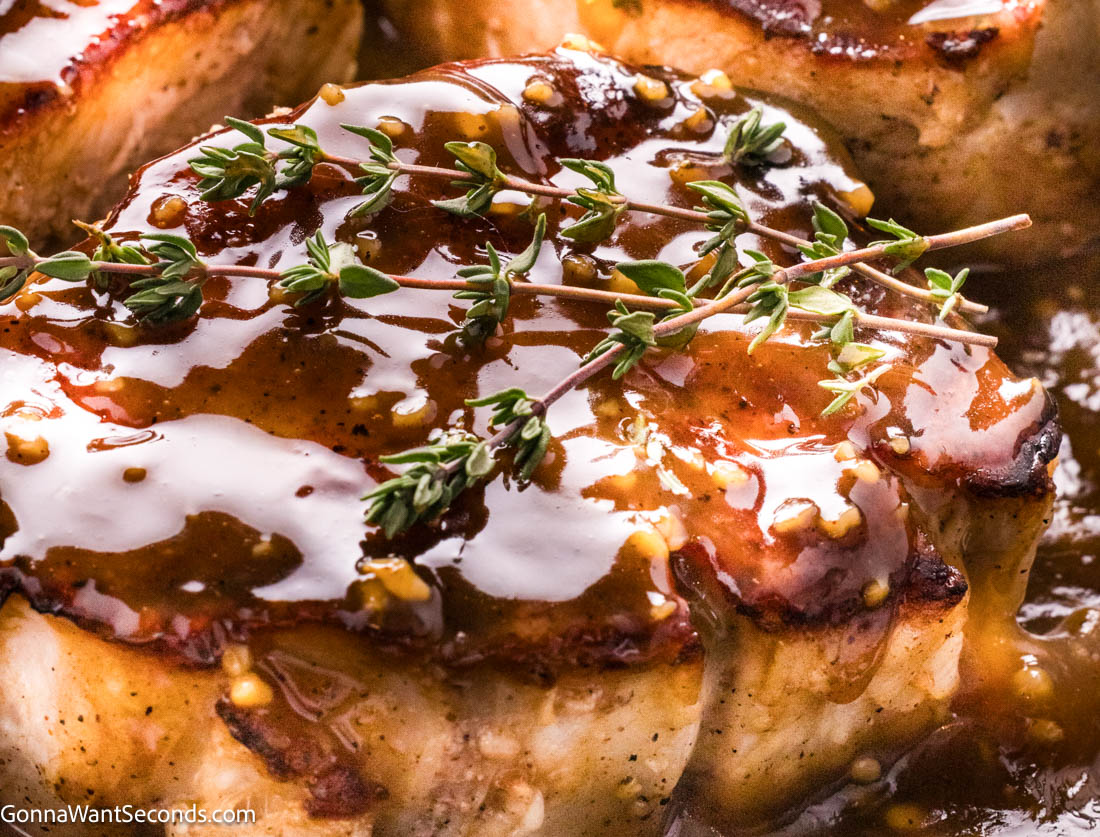 Brown Sugar Pork Chops with sauce on a serving platter