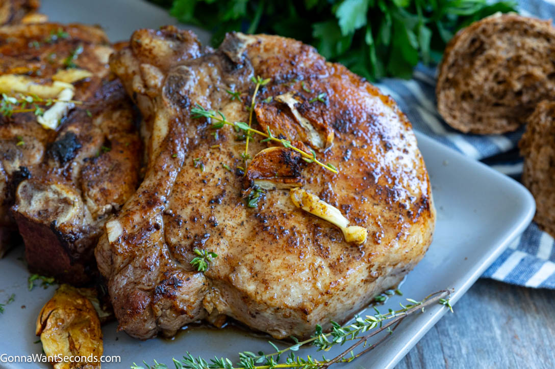 pan seared pork chops on a plate