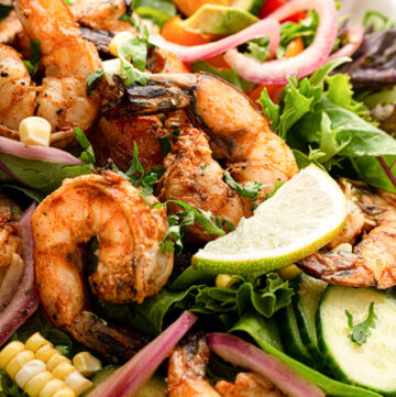 grilled shrimp salad on a serving platter