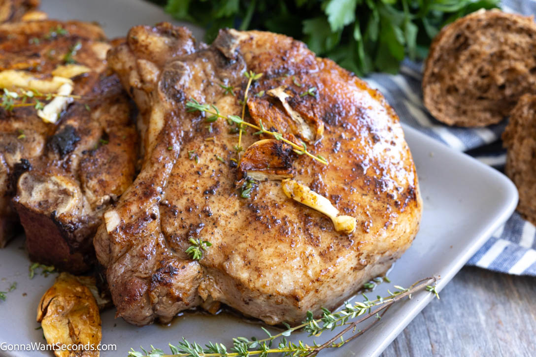 pan seared pork chops on a plate