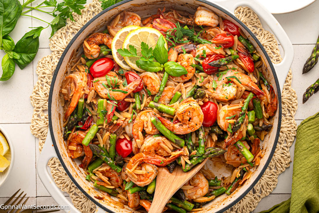 shrimp orzo recipe in a skillet top shot