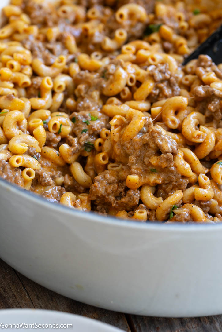 Enjoy the best Homemade Hamburger Helper with tender pasta, seasoned beef, and creamy cheese sauce. This easy one-pan dinner is ready in 50 minutes. #hamburgerhelper #onepandinner Hamburger helper in a pot