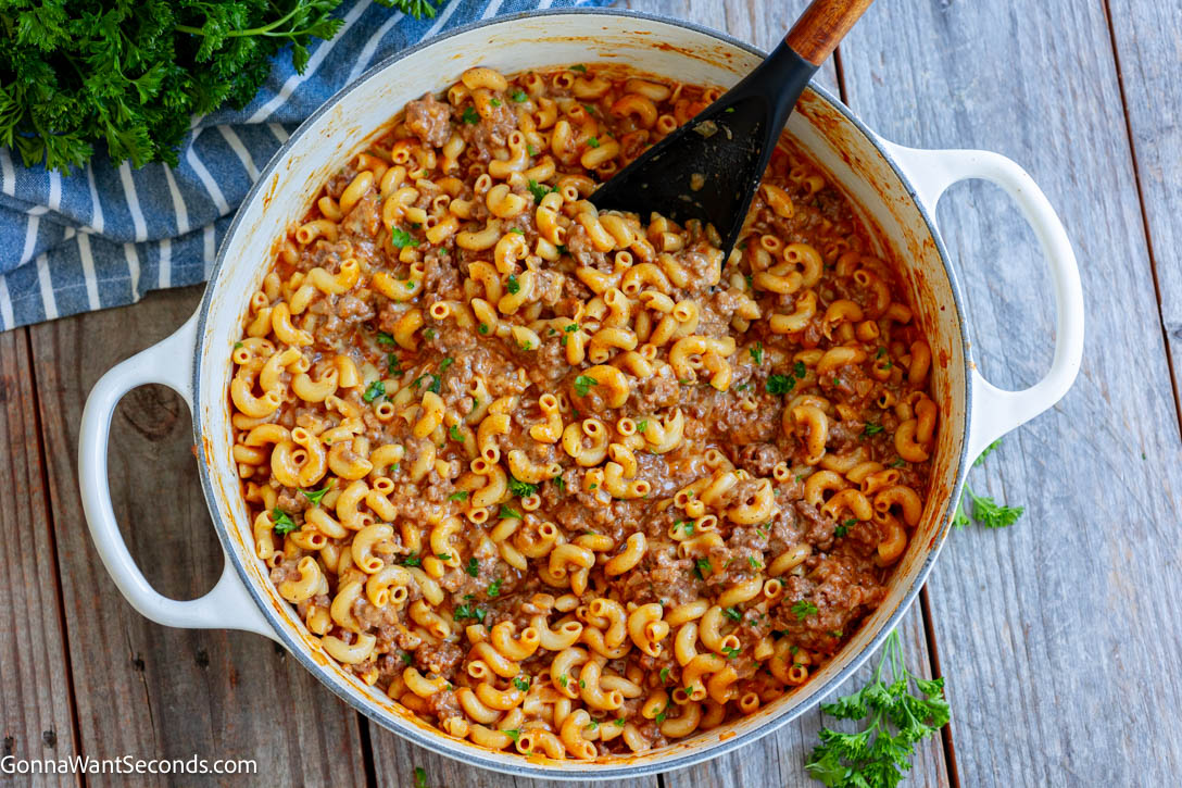 Enjoy the best Homemade Hamburger Helper with tender pasta, seasoned beef, and creamy cheese sauce. This easy one-pan dinner is ready in 50 minutes. #hamburgerhelper #onepandinner Hamburger helper in a pot